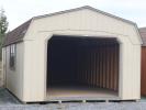 Pine Creek 14x24 Dutch Garage with Beige walls, Buckskin trim and Buckskin Z-Style shutters, and Barkwood shingles